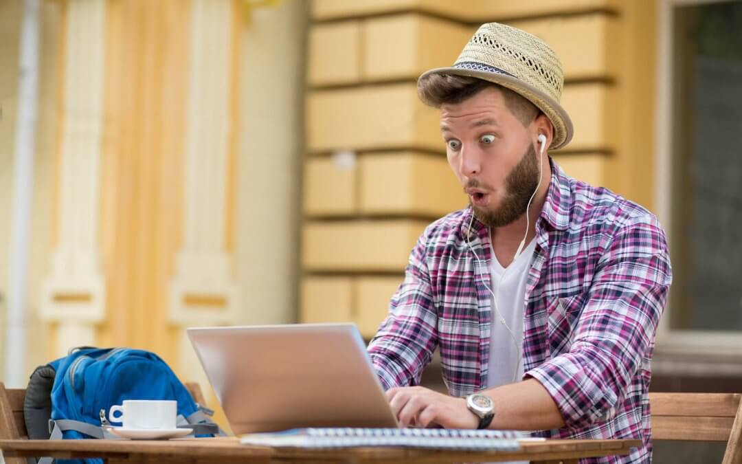 man excitedly training online on zoom call